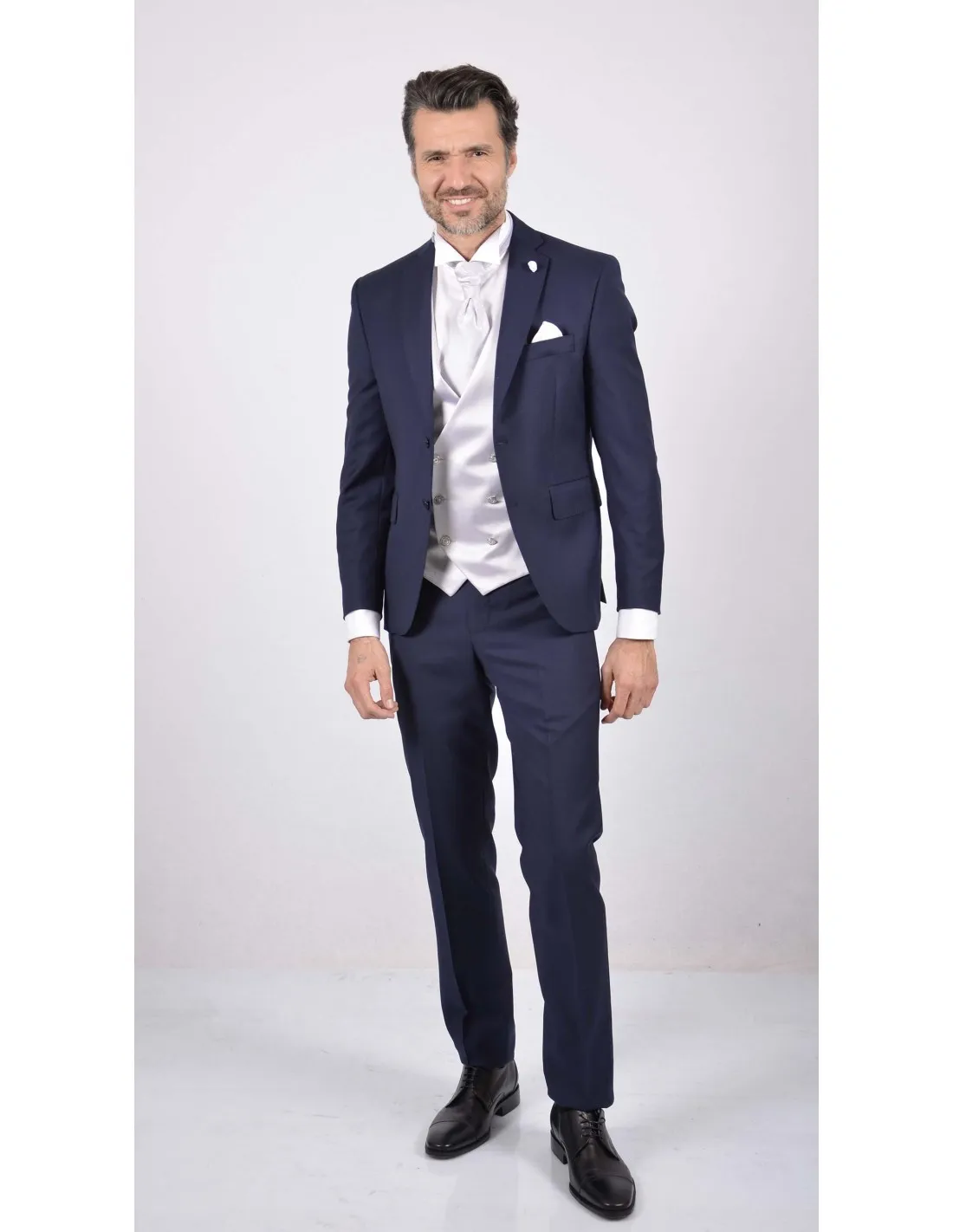 Abito blu con gilet doppiopetto