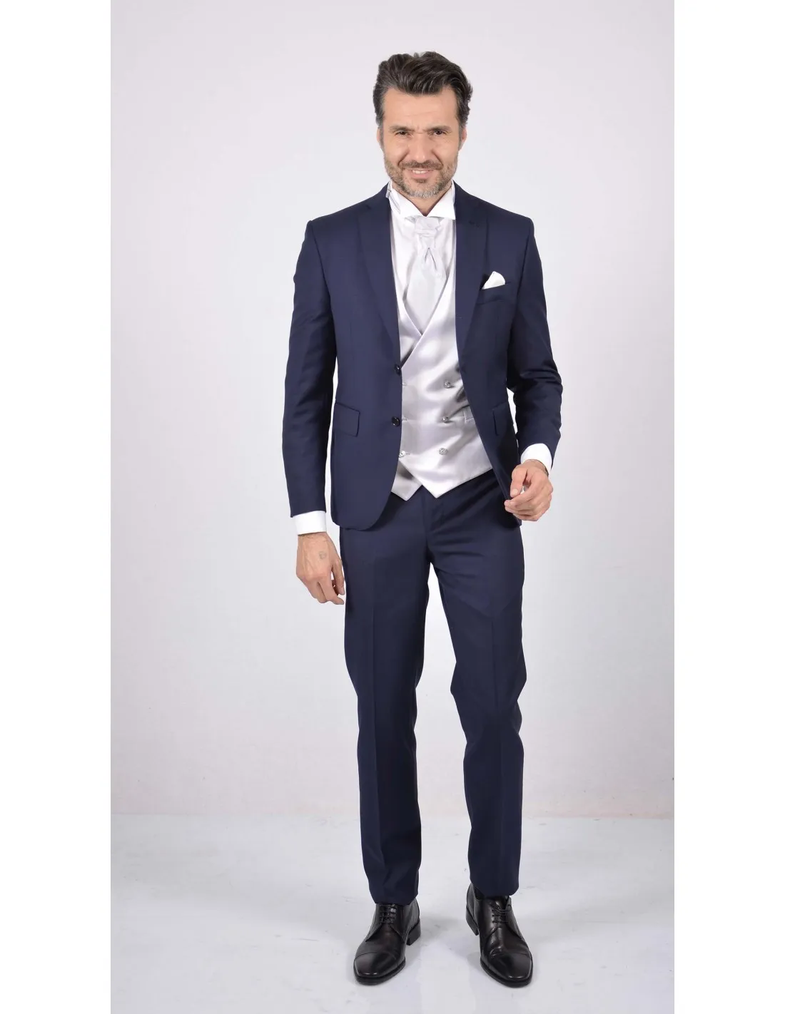 Abito blu con gilet doppiopetto