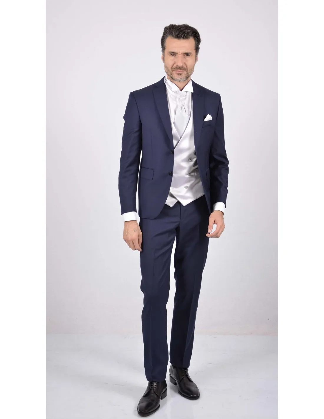 Abito blu con gilet doppiopetto