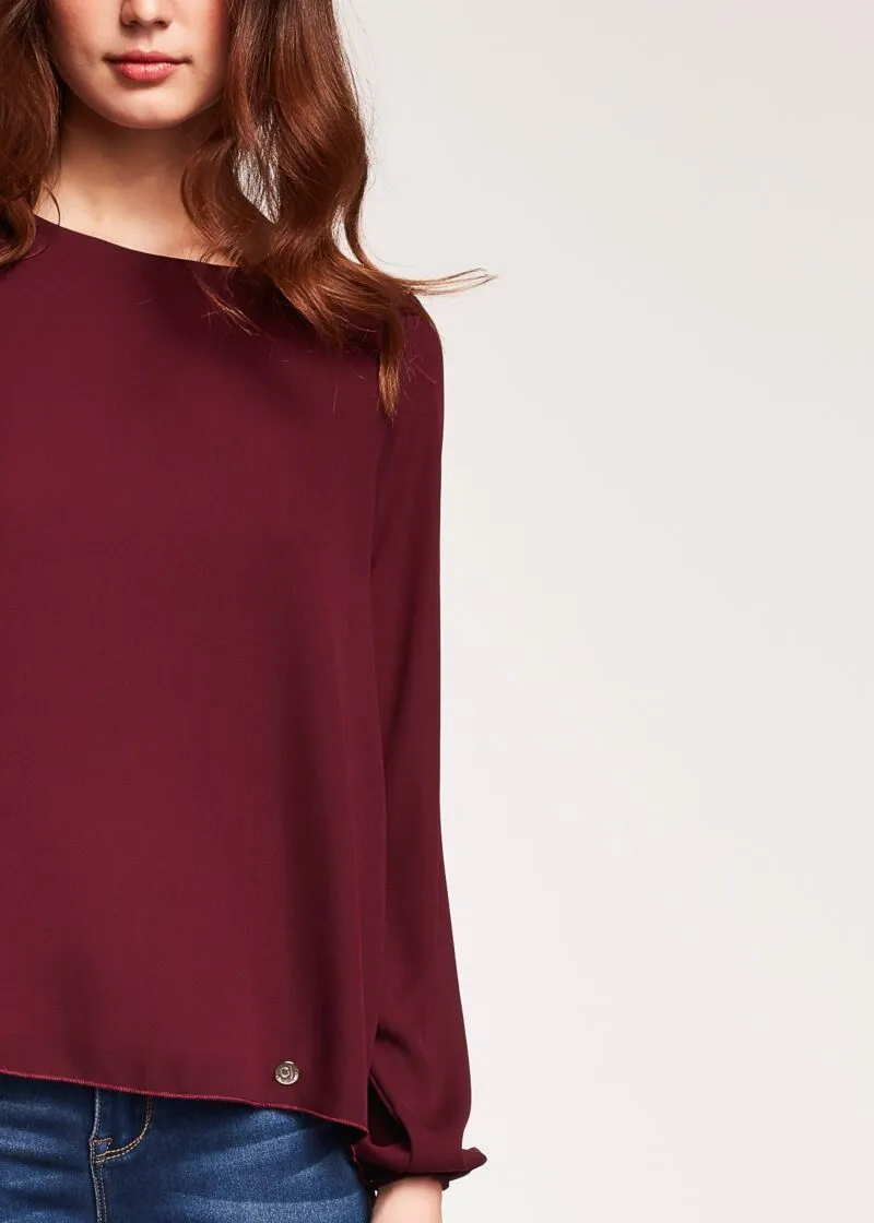Blusa con inserto plissé