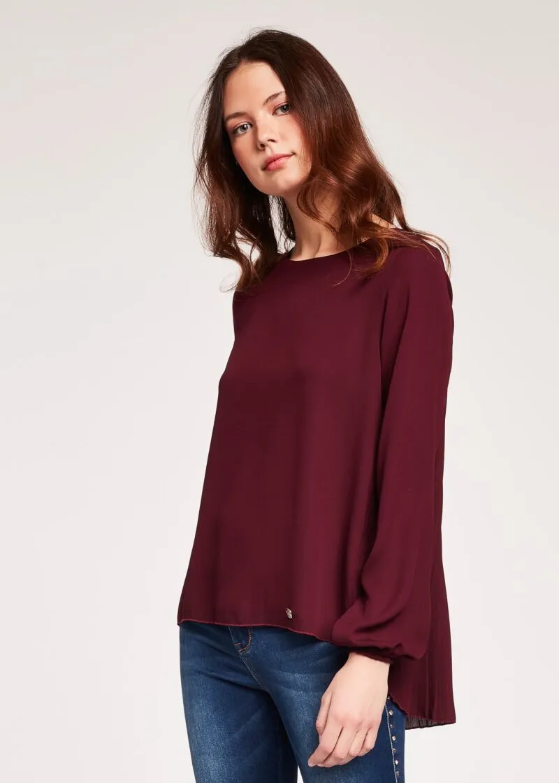 Blusa con inserto plissé