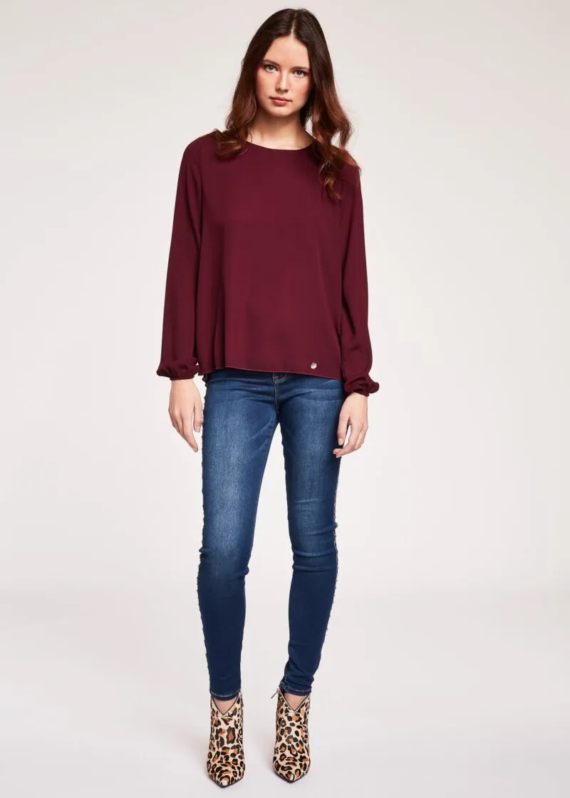 Blusa con inserto plissé