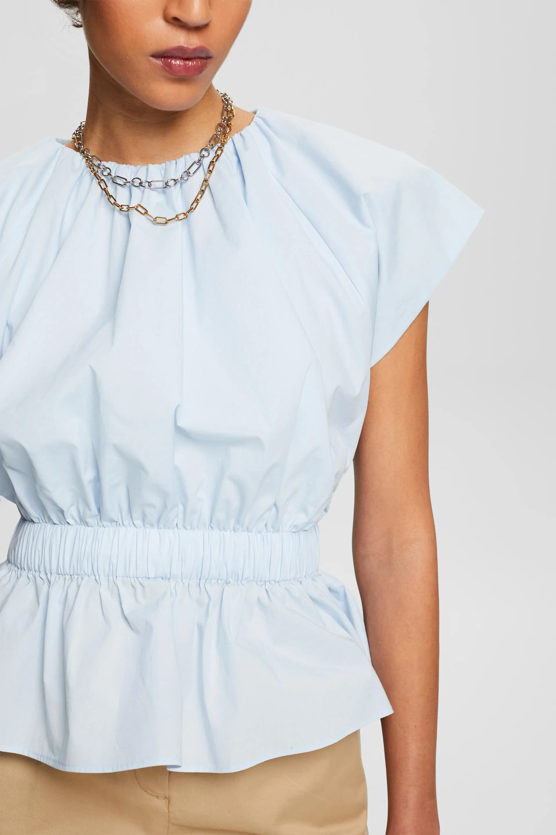 Blusa in popeline con balza