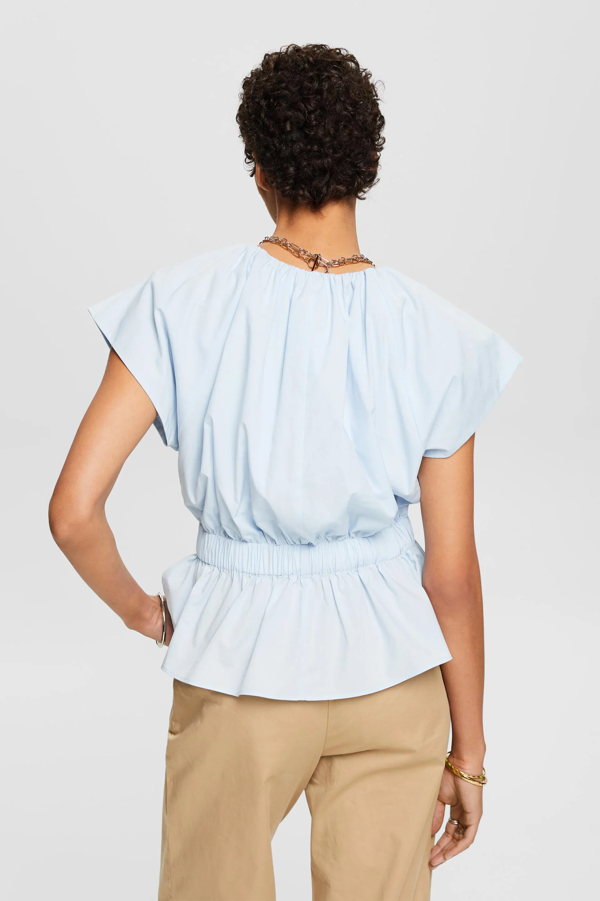 Blusa in popeline con balza