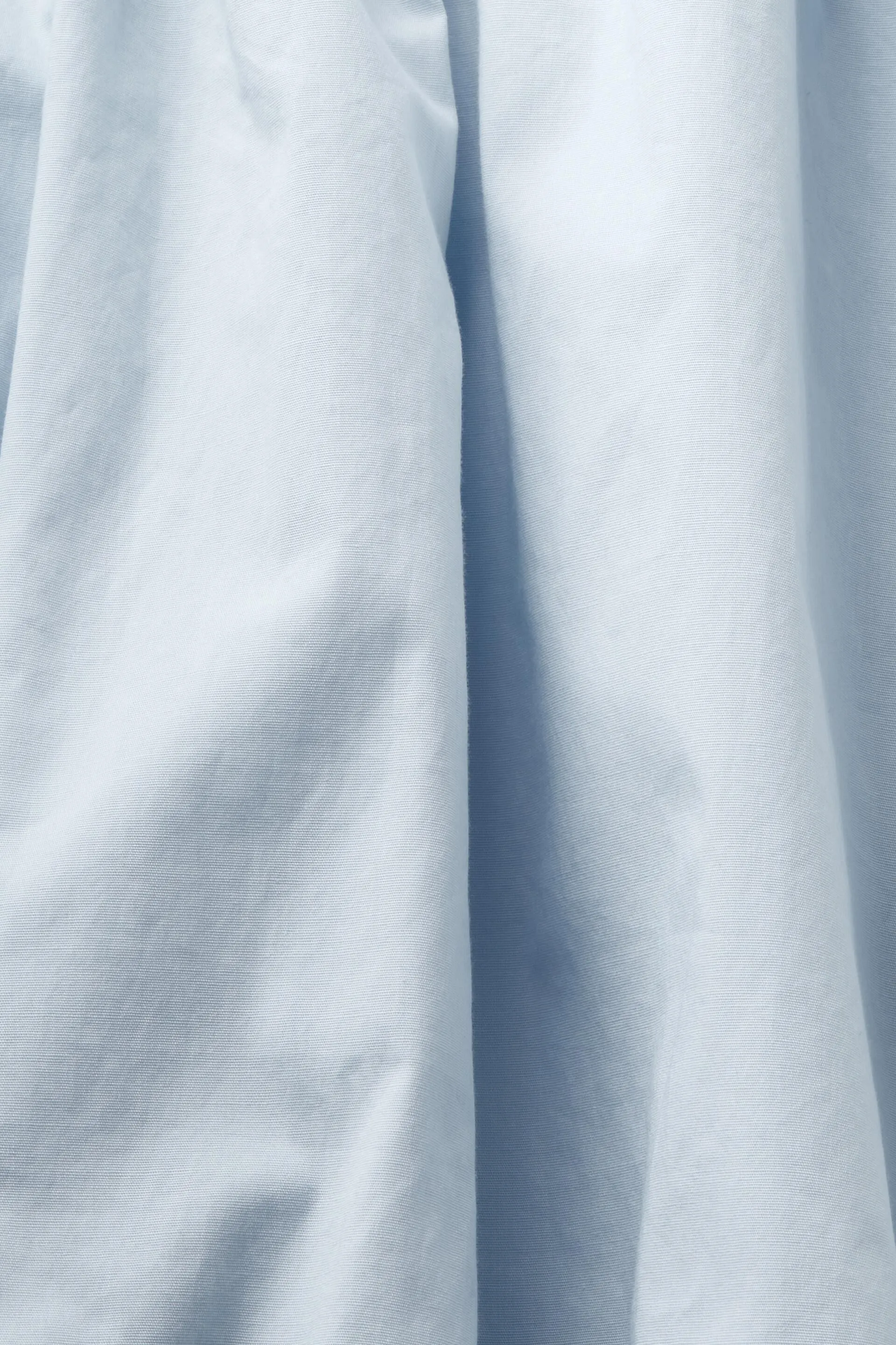 Blusa in popeline con balza