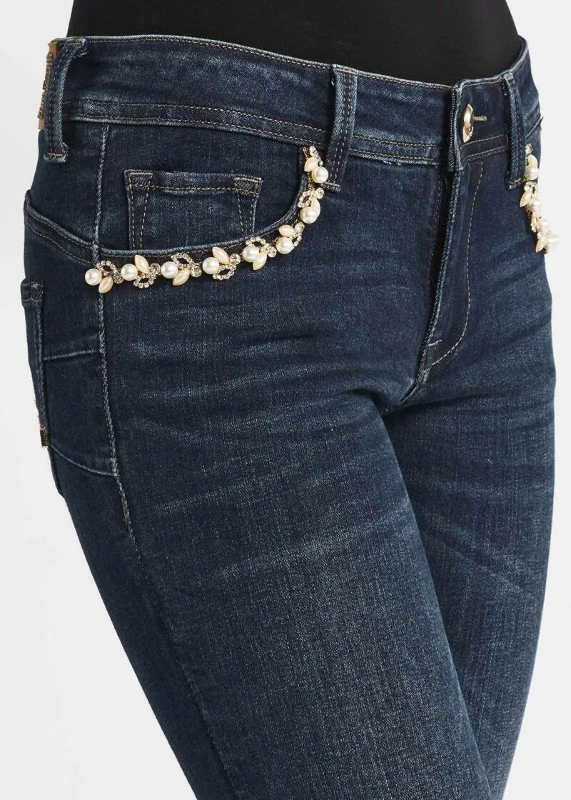 Jeans skinny con dettagli gioiello