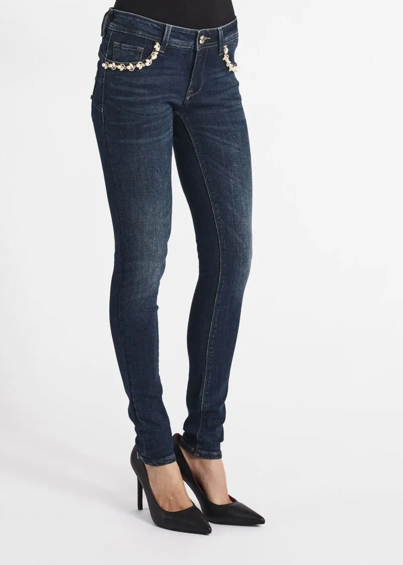 Jeans skinny con dettagli gioiello