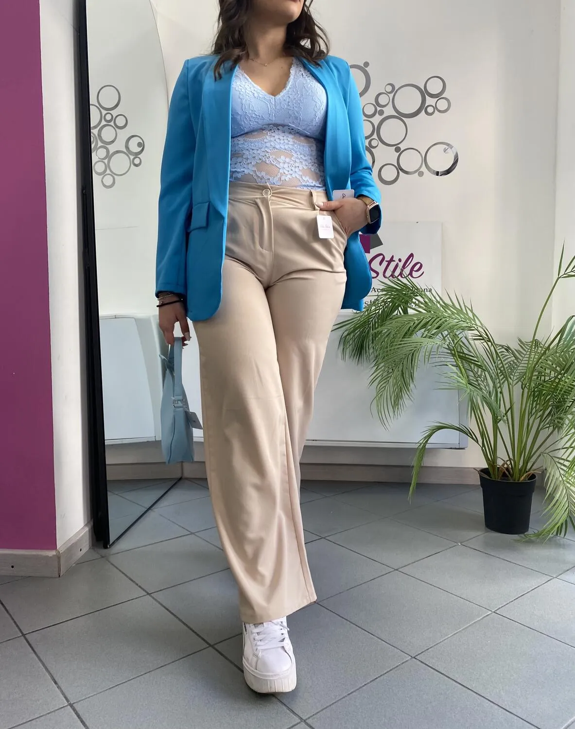 Pantalone palazzo beige con cintura
