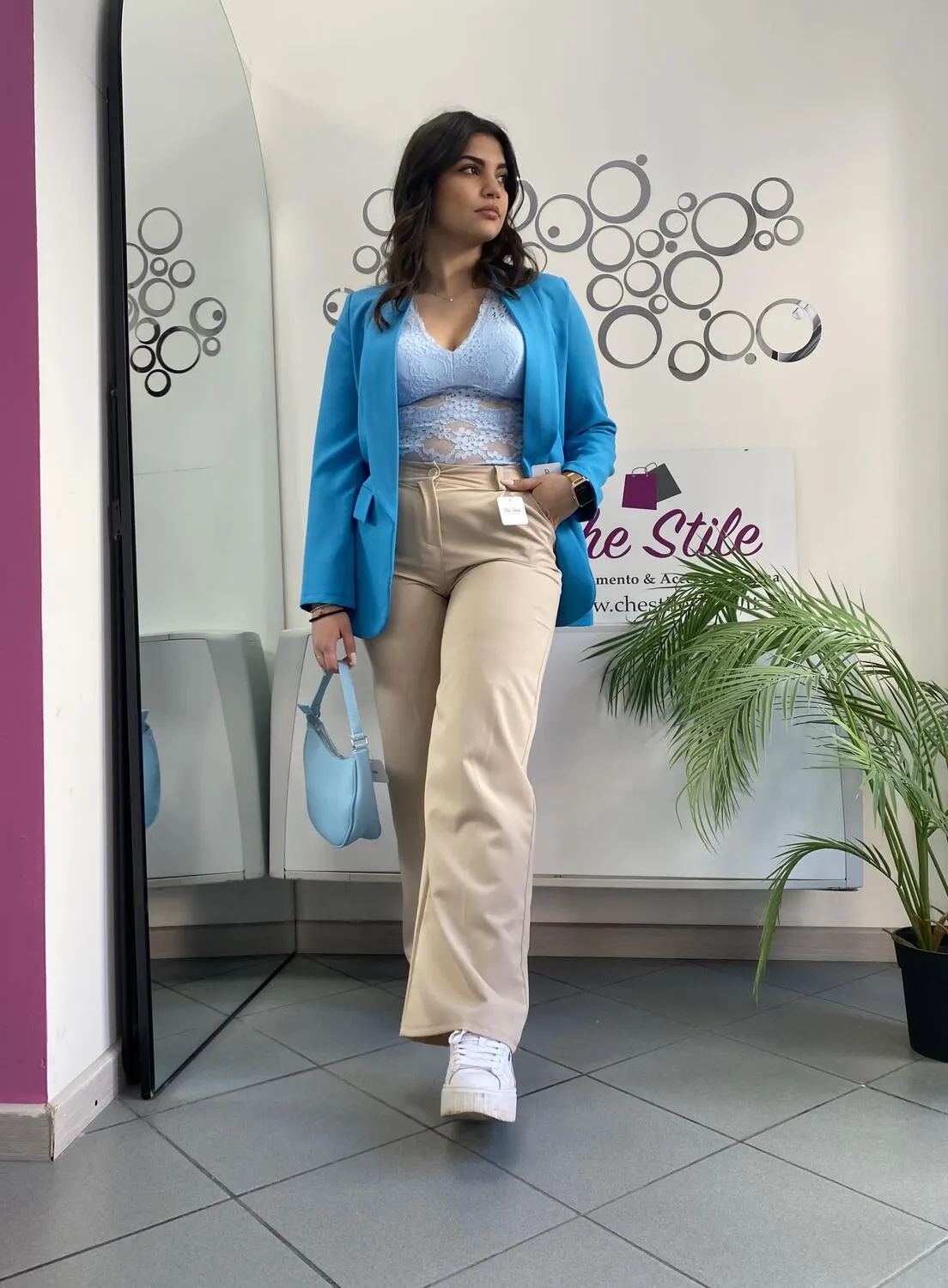 Pantalone palazzo beige con cintura