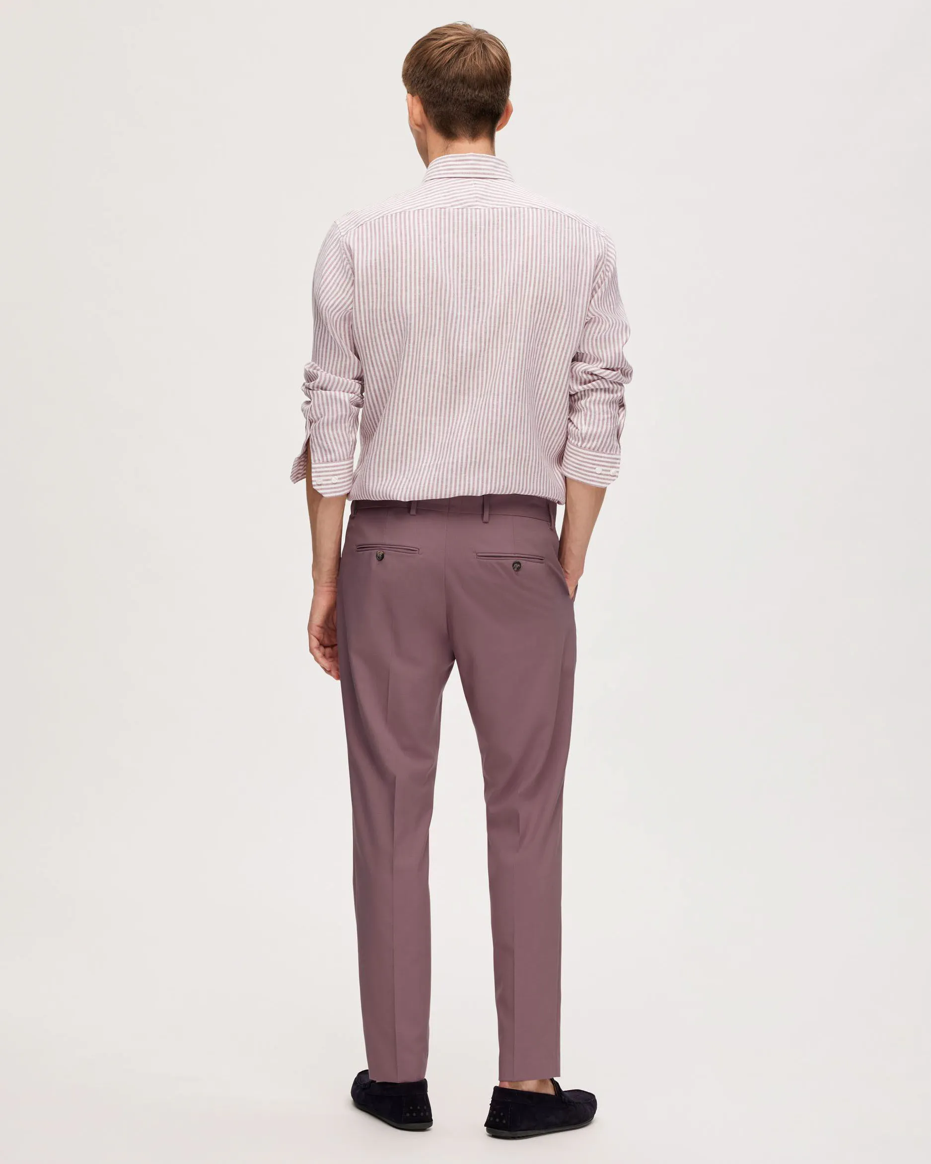 Pantaloni slim rosa antico in tela di misto viscosa stretch con piega stirata