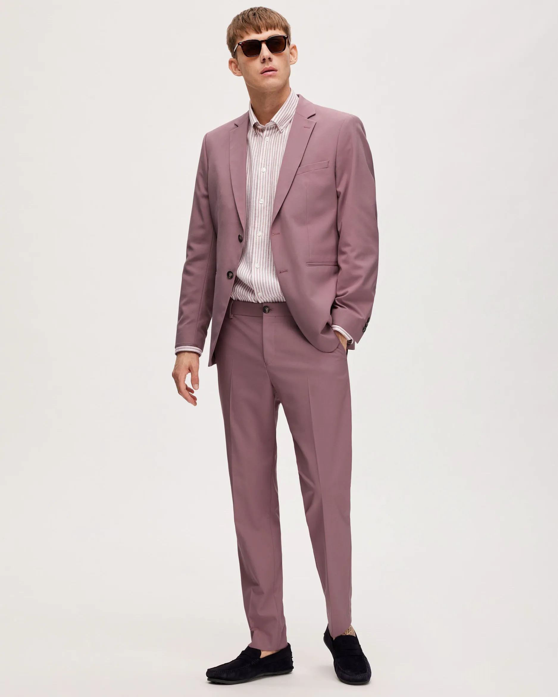 Pantaloni slim rosa antico in tela di misto viscosa stretch con piega stirata