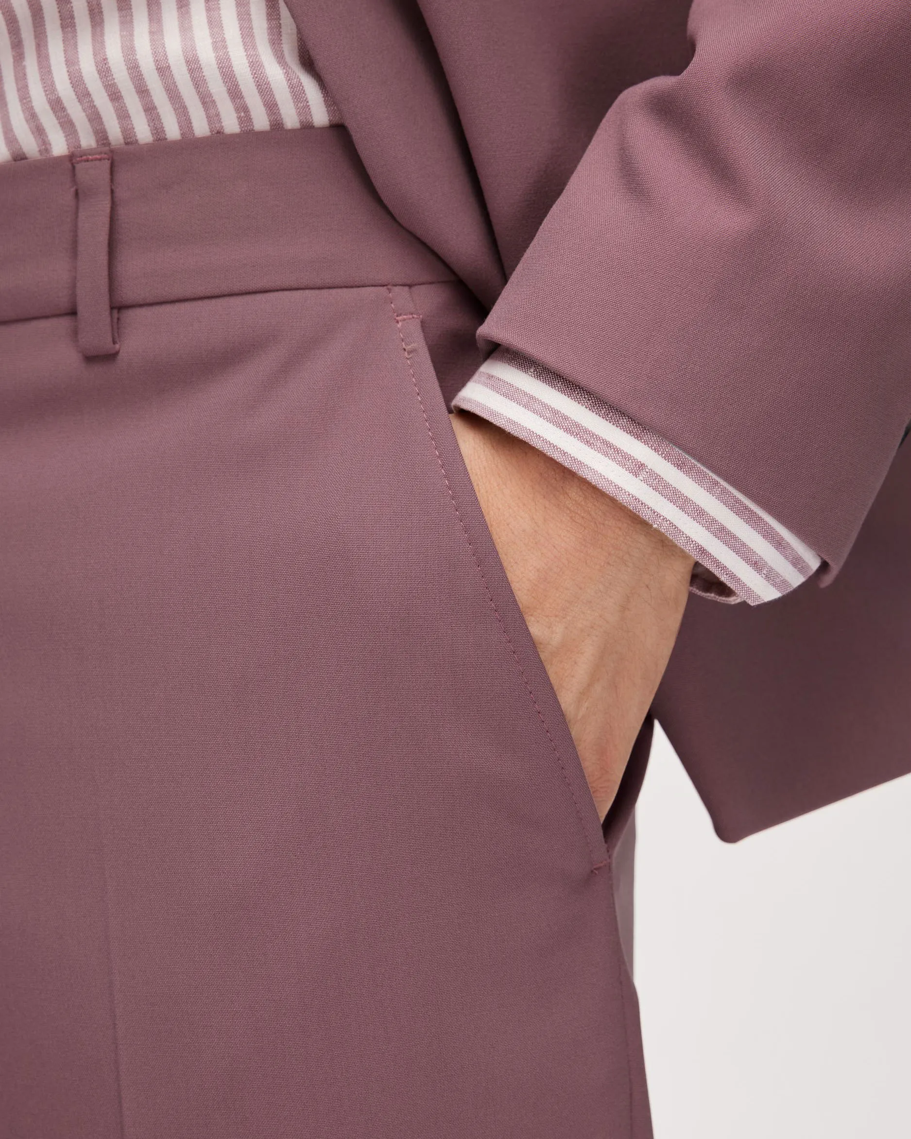 Pantaloni slim rosa antico in tela di misto viscosa stretch con piega stirata