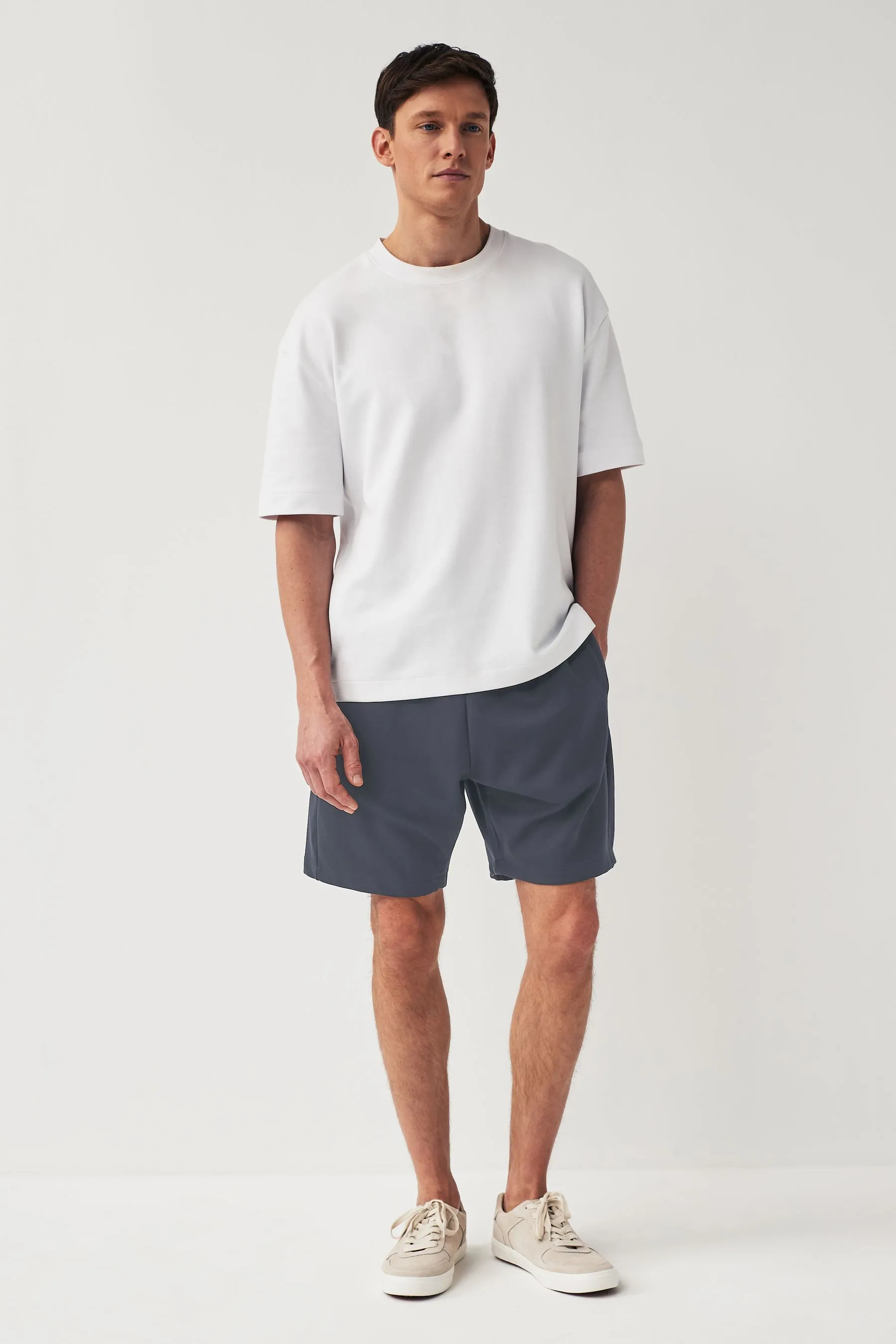 Shorts in jersey con tasche con zip