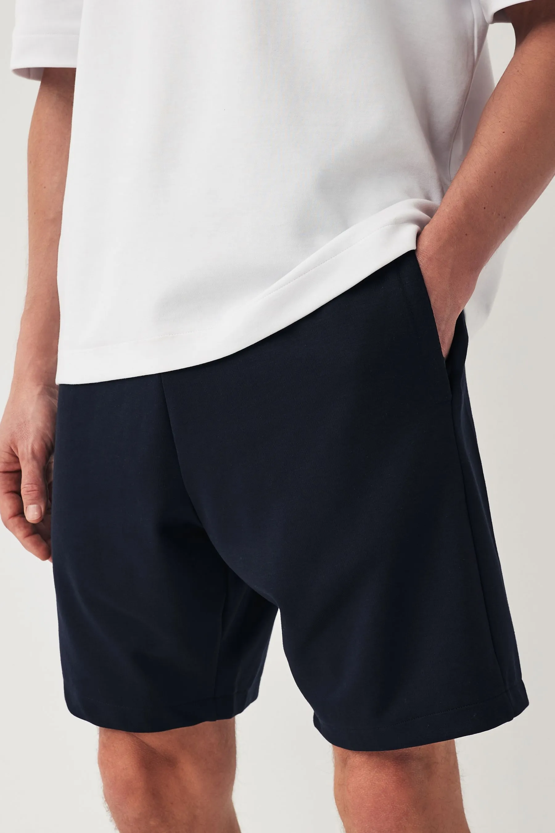 Shorts in jersey con tasche con zip