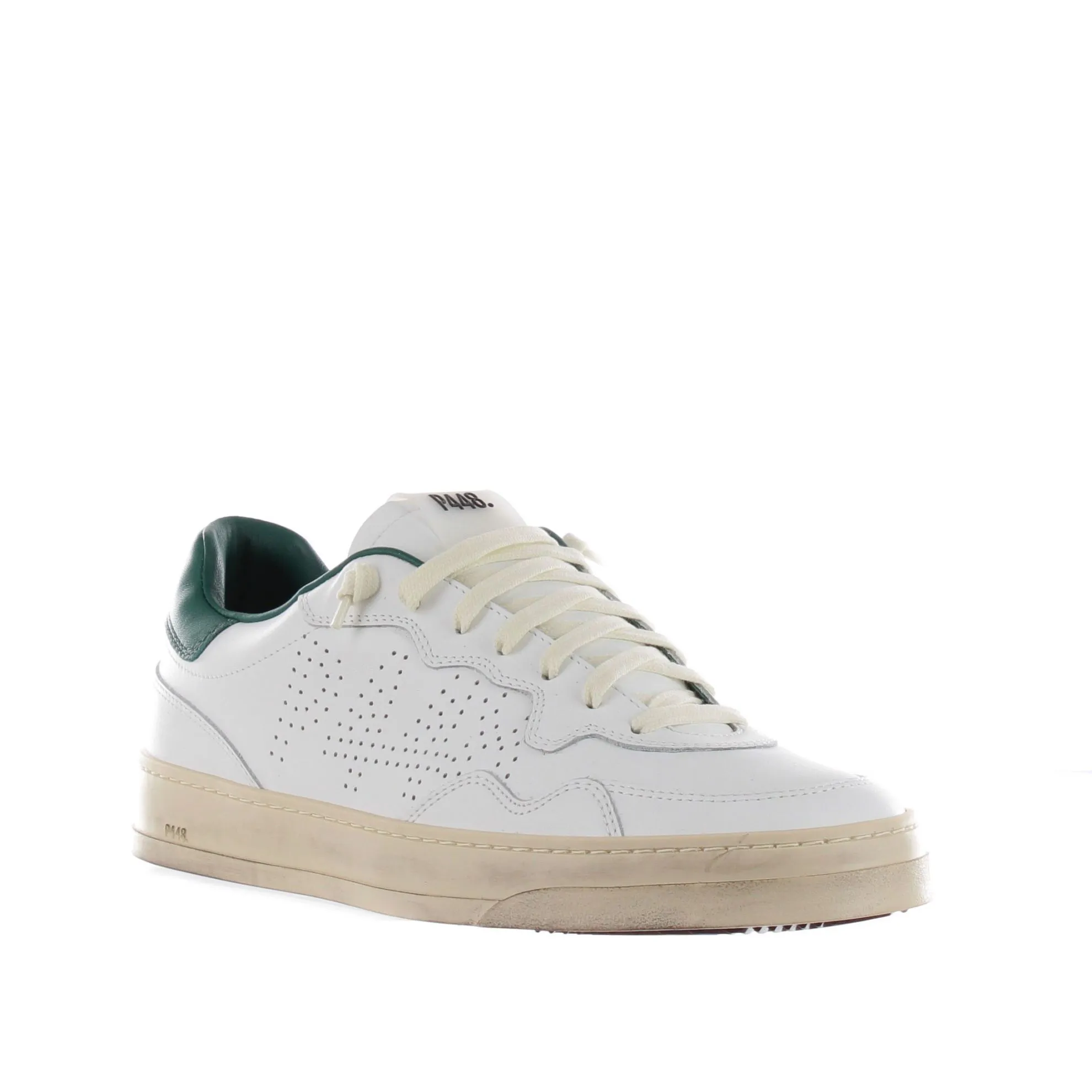 Sneaker in pelle con logo traforato
